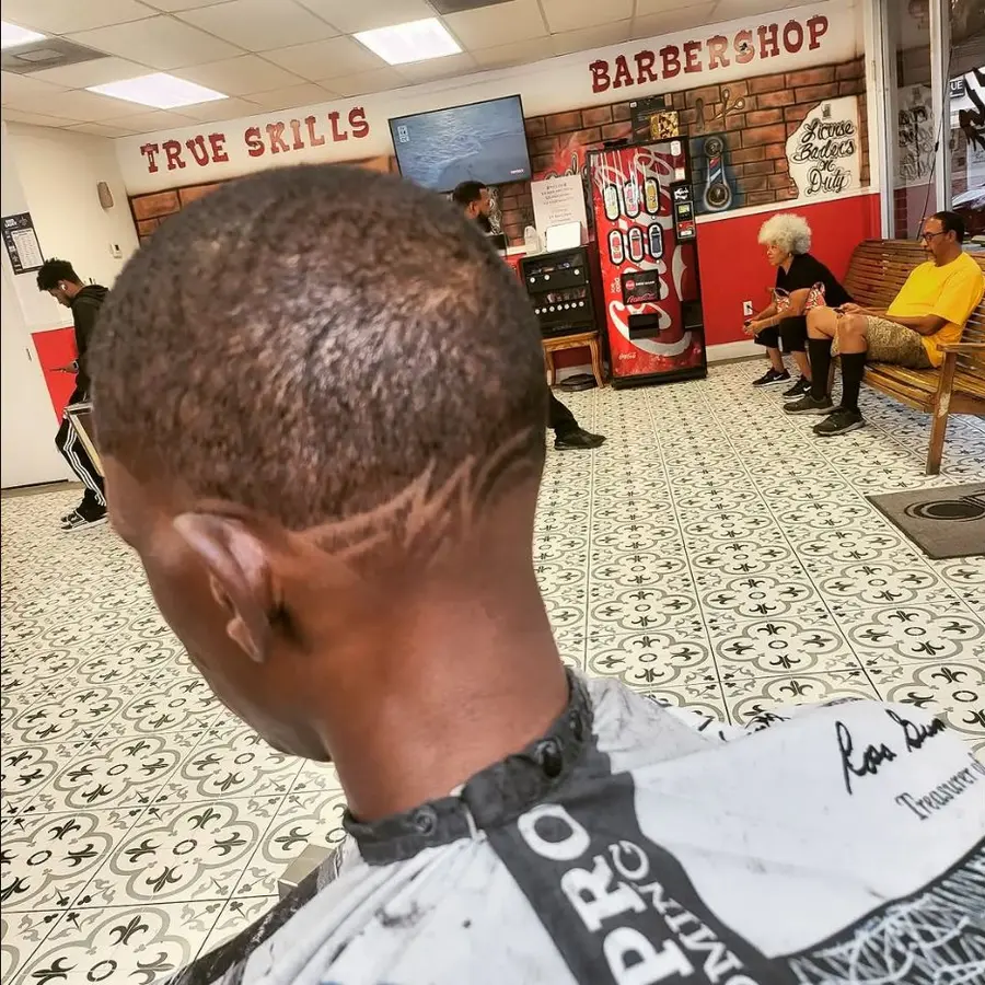 True Skills Barbershop interior behind a detailed haircut design