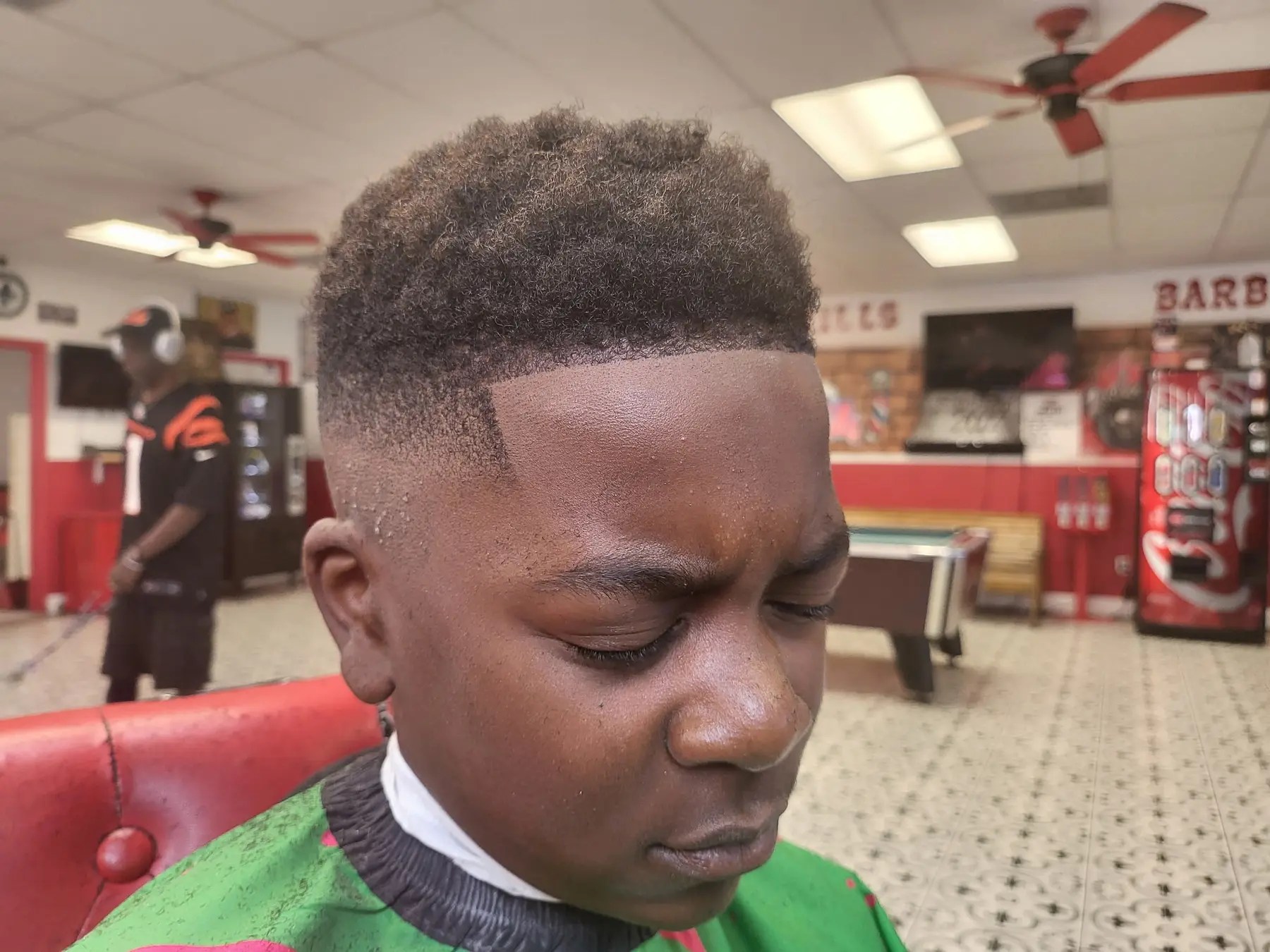 Young True Skills client with a shaped high-top and an exceptionally sharp lineup